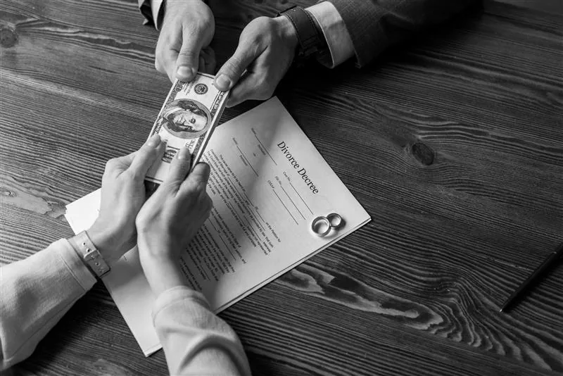 Couple pulling on banknote over legal documents — Split podcast episode 9
